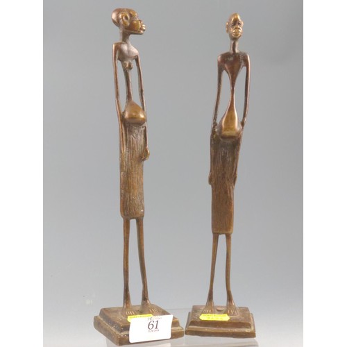 61 - Two brass African Maasai figures. Height 29cm.