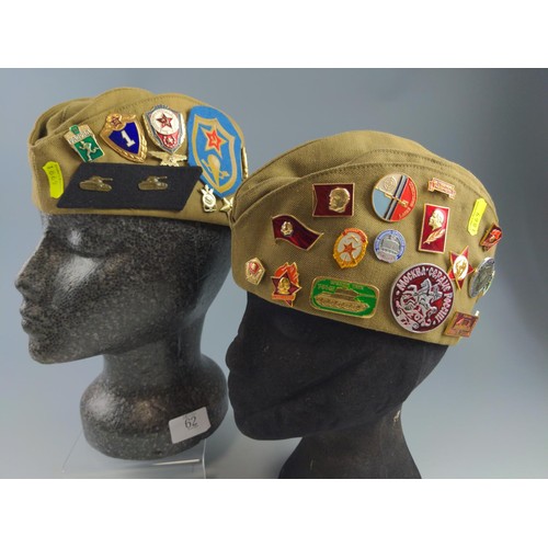 62 - Two military caps with Communist Soviet badges.