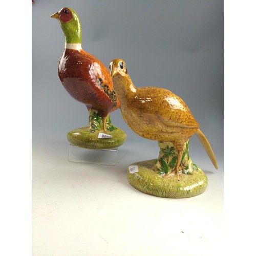 69 - Male and female ceramic pheasants both signed Audrey 1978. Tallest 31cm