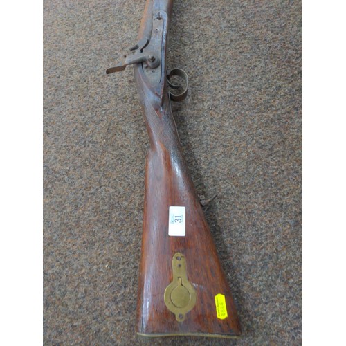 31 - Antique flintlock rifle in as found condition. Length 123cm