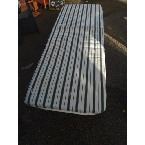 924 - Two folding single beds, very lightly used