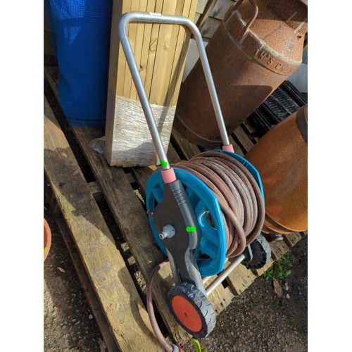 551 - Hose pipe on reel by Gardena 