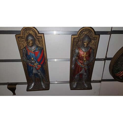 51 - 5 cold painted metal plaques featuring knights. Largest measures 35.5 x 38.5. Together with a framed... 