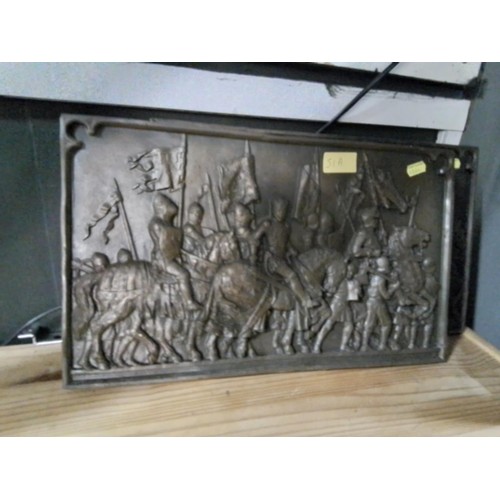 328 - Two bronzed plaster reliefs of battle scenes. 41cm x 25cm