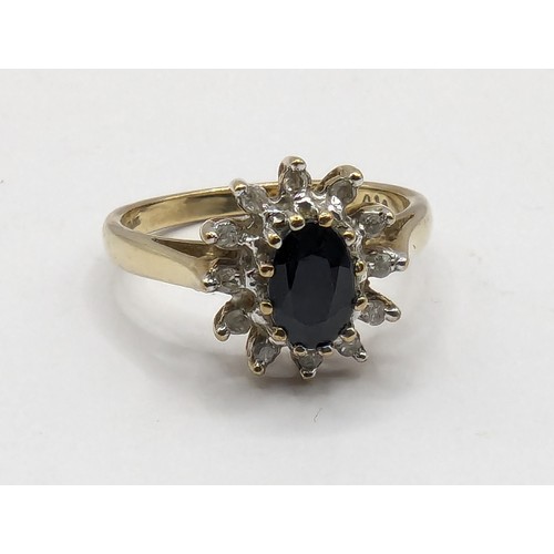 229 - 9ct gold, sapphire and diamond cluster ring, size I1/2, gross weight 2.18 grams