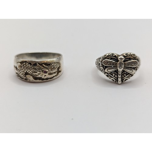 244 - Four pieces of 925 silver jewellery, including two neck chains and two rings (size S & W respect... 