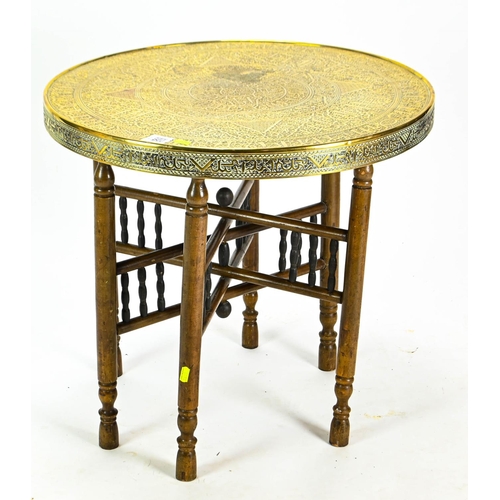 526 - Benares brass topped table. 60cm by 56cm