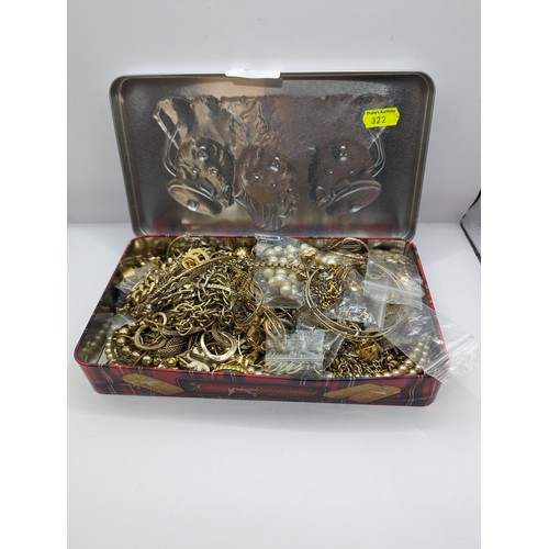 256 - Tin of gold tone jewellery
