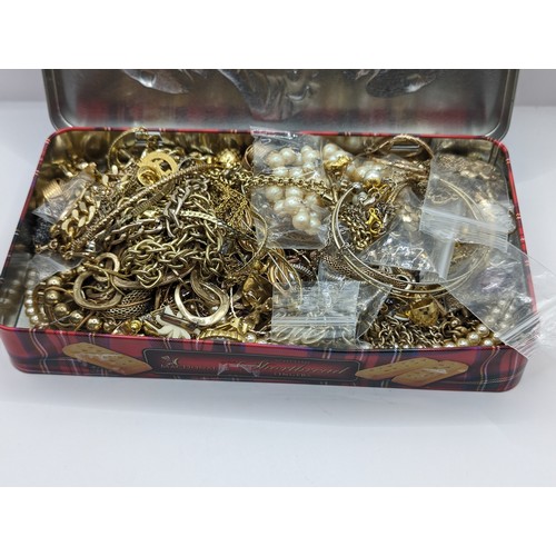 256 - Tin of gold tone jewellery
