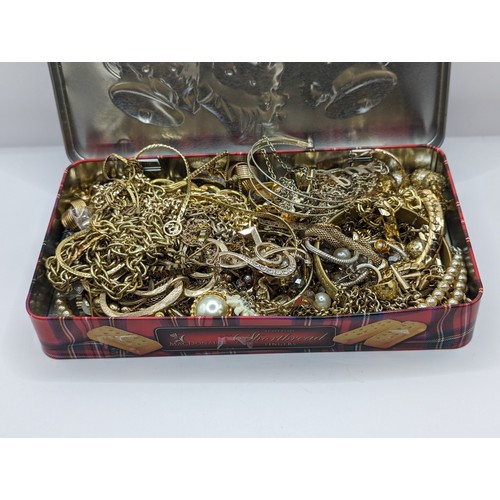 256 - Tin of gold tone jewellery