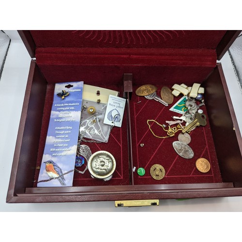 258 - Burgundy coloured jewellery box and contents