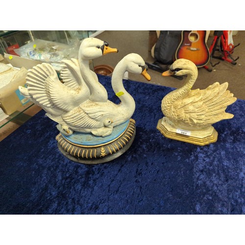 351 - Two swan doorstops. Height of tallest 28cm.