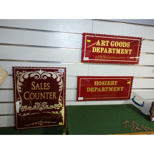 45 - Three F.W Woolworth & co Ltd. scalloped glass tablets/shop department signs, largest 36 x 45cm