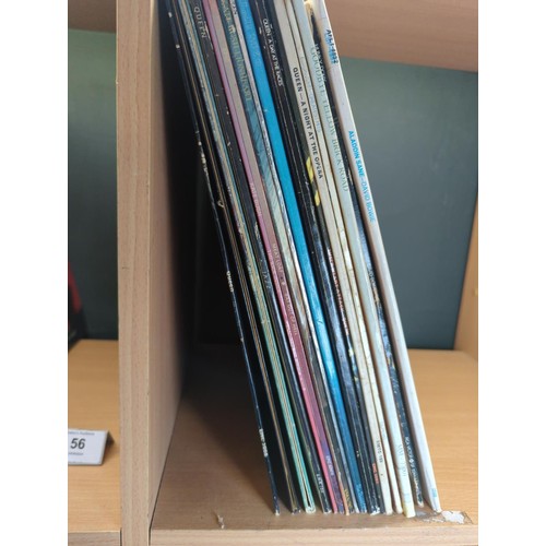 58 - Approx. 17 vinyl albums inc. Queen, Bowie and Meatloaf.