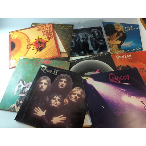 58 - Approx. 17 vinyl albums inc. Queen, Bowie and Meatloaf.