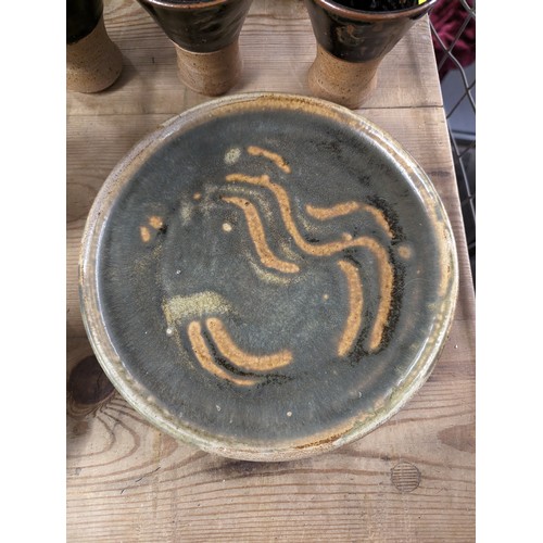 356 - Muchelney stoneware jug together with a tapped flagon, 6 goblets, planter and tray.