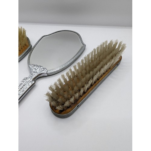 281 - Art Deco style green enamel and chrome three piece dressing table set