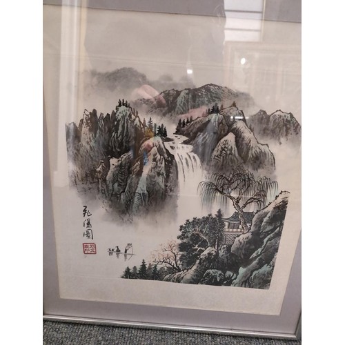 37 - Two framed Chinese artworks, block print of a dragon and painting of a landscape. Largest measures 4... 