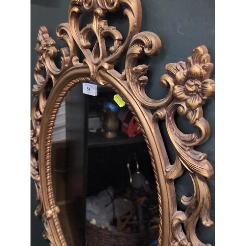 54 - Oval mirror in gilt frame 90 x 56cm