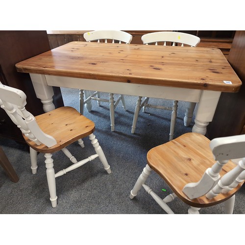 500 - Pine kitchen table with 4 chairs 81cm by 135cm by 77cm