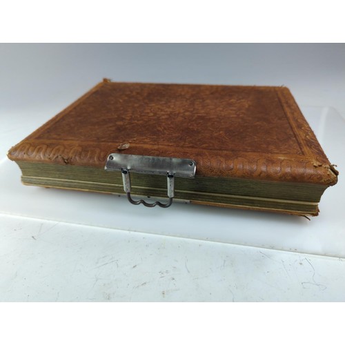 83 - Early C19 leather bound Illustrated family bible together with a Victorian photograph album in as fo... 