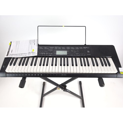 147A - Casio CTK-3500 touch sensitive keyboard with music stand, instructions and keyboard stand