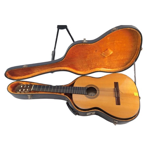 151 - Harald Petersen Model A acoustic concert guitar with hard case.