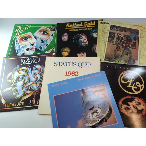 68 - 10 vinyl rock albums inc. The Rolling Stones Greatest Hits and Springsteen Live.