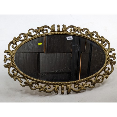 54A - Ornate oval framed mirror