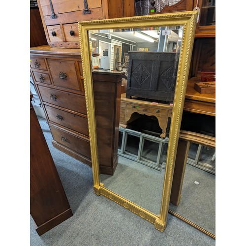 52 - Large bevelled rectangular mirror 68cm by 139cm