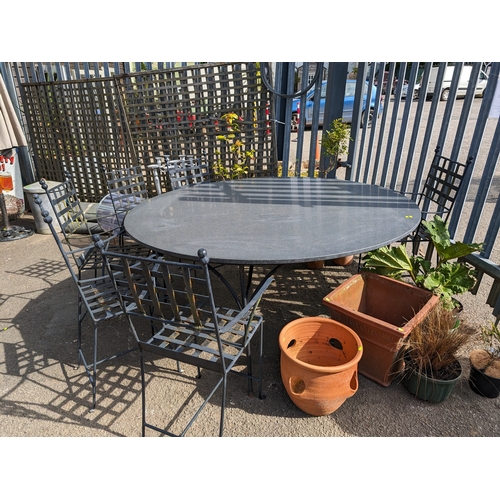 168 - Impressive granite topped circular garden table with metal base. D176cm H80cm