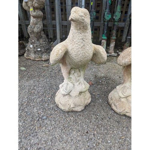 22 - Pair of concrete eagle statues, ht.54cm