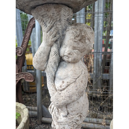 30 - Concrete cherub bird bath with some areas of loss to the bath D41cm x H81cm