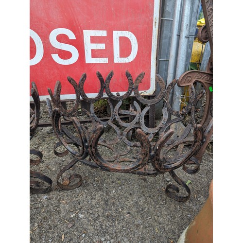 35 - Pair of horse shoe fire baskets, dia.53cm