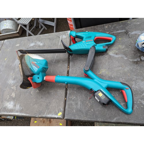 242 - Bosch strimmer art26LI + Bosch easy hedge cut 12-350 both with batteries and chargers