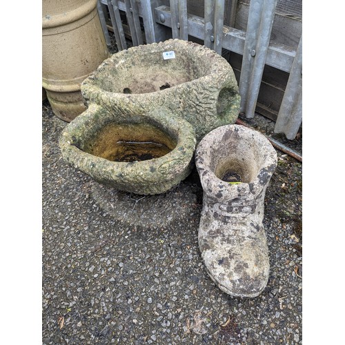 46 - Concrete planter ht. 28cm, together with concrete boot planter