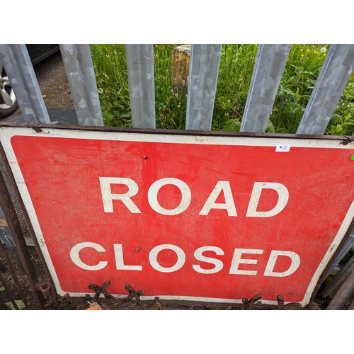 52 - 'Road Closed' sign together with four plastic cones