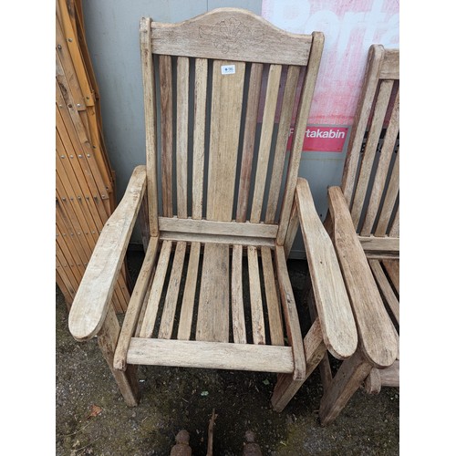 96 - Two wooden garden chairs