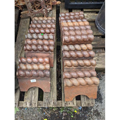 88 - Twenty three Victorian terracotta rope edging tiles 24 x 18cm