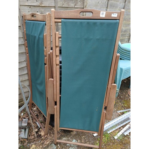 118 - Pair of teak framed deckchairs with green fabric seats