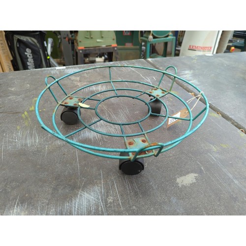 122 - Six wheeled wire plant stands