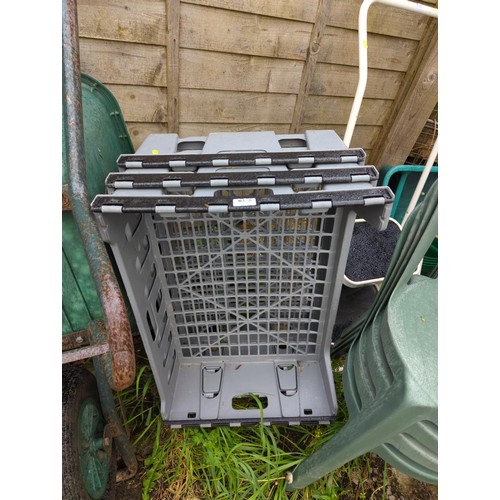 128 - Three grey bakers stacking trays