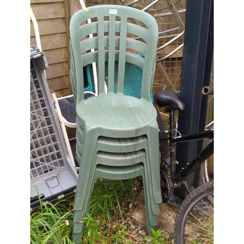 130 - Four plastic garden chairs