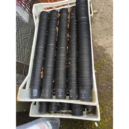 154 - Two crates of small plastic plant pots