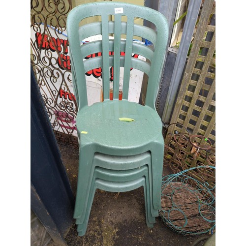 160 - Four plastic garden chairs