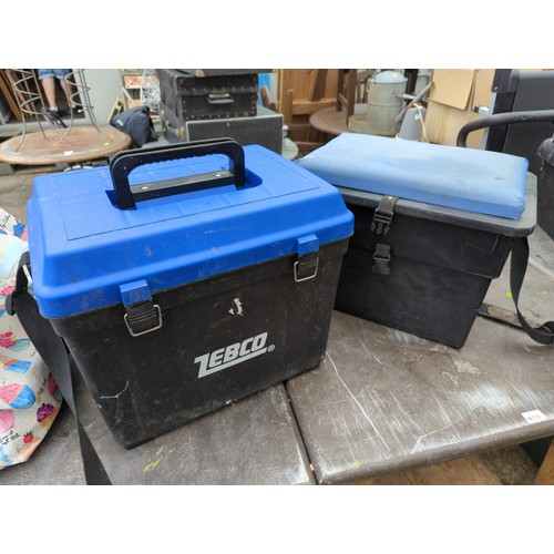 228 - Four fishing boxes/seats, one plastic fishing accessories box and a canvas kit bag