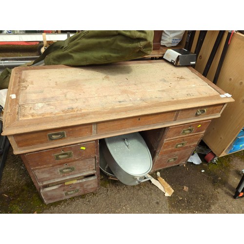 229 - Seven drawer pedestal desk with broad arrow 1915 marked to lock plates (AF) 126cm x 59cm x H71cm