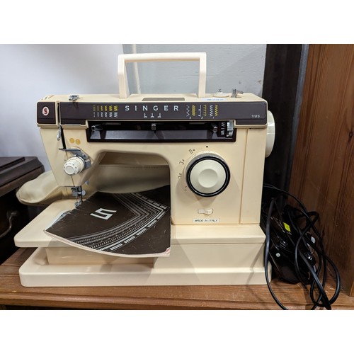 732 - singer S electric sewing machine with cover and instructions