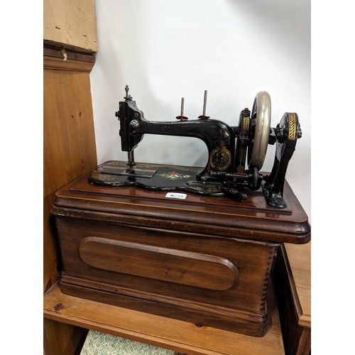 733 - Bradbury company limited manual sewing machine. box  45cm by 25cm by 25cm