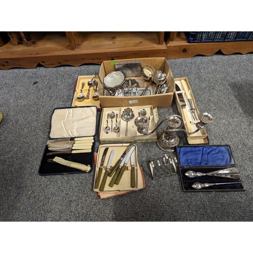 726 - Box of mostly silver plated items including flatware with some stainless items.